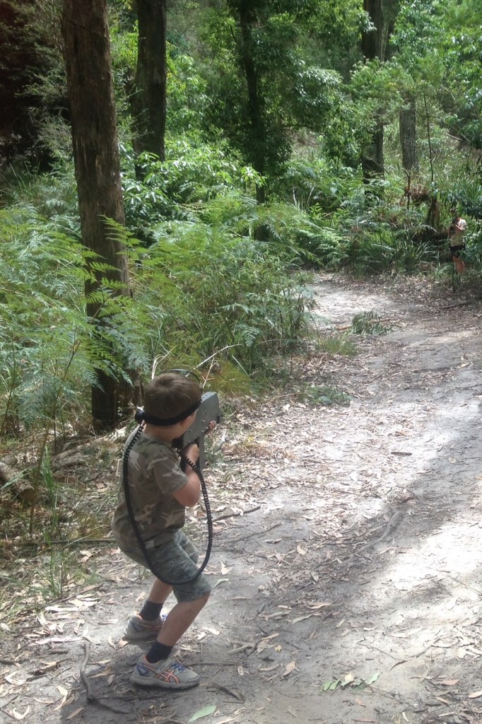 Alby playing laser tag in the bush