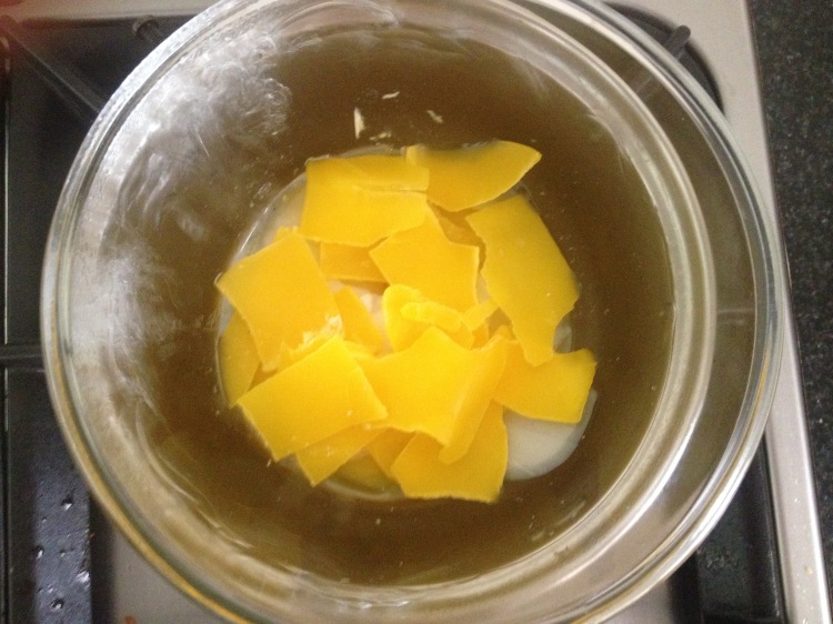 Melting the wax from my cheese in a double boiler.