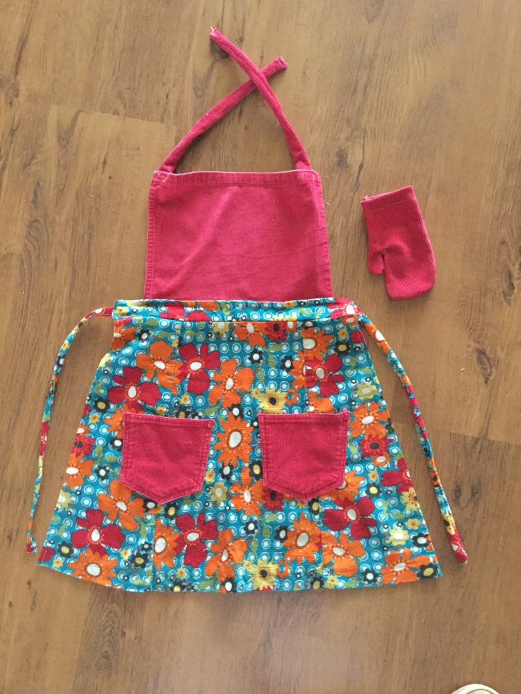 Childrens apron and oven mitt handmade from upcycled materials.
