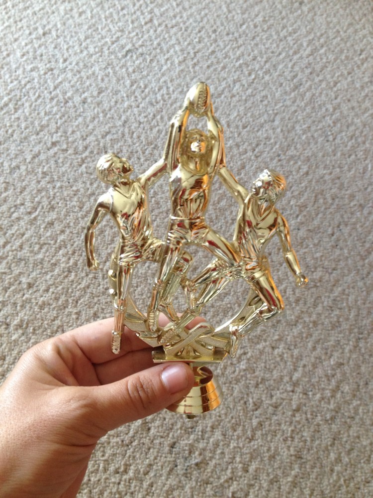 Reuse trophy figurines as cake toppers.