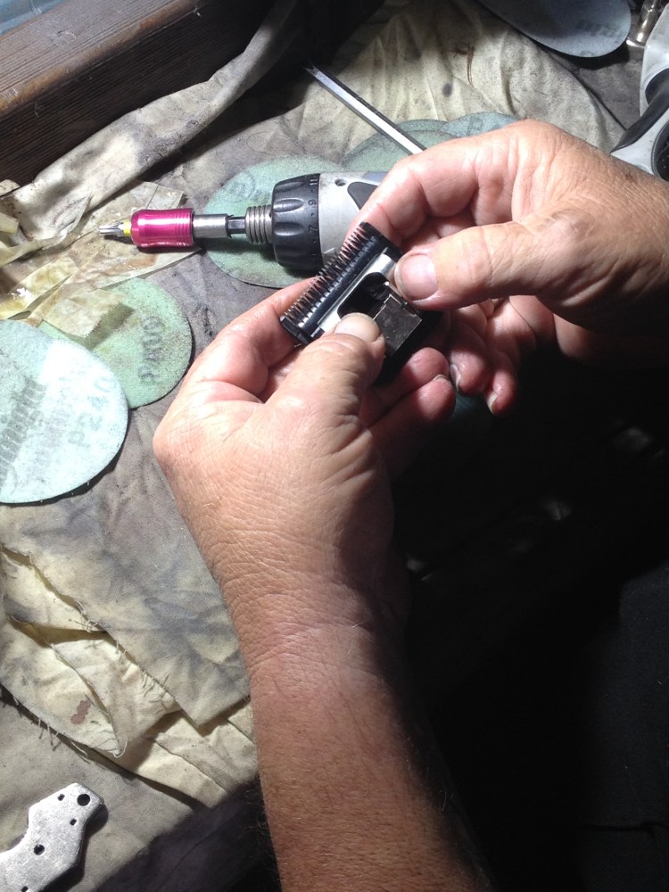 Sharpening the dog grooming clippers