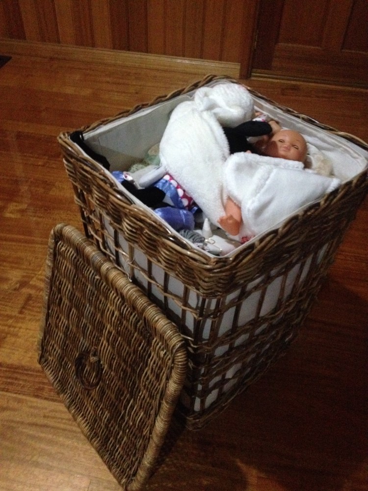 Pack toys into a laundry basket when moving house to reduce waste.