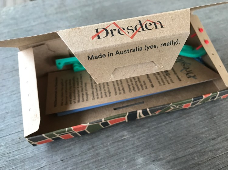 Dresden cardboard packaging and interchangeable frame parts.